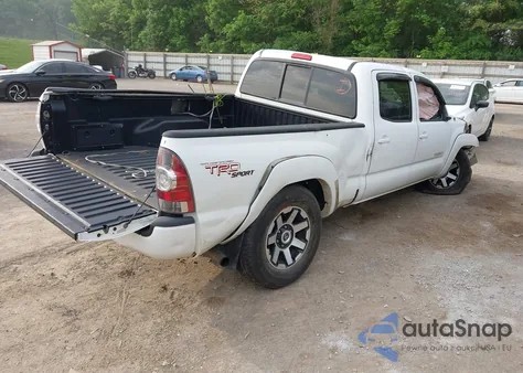 2009 Toyota Tacoma Base V6 из США, поврежденный, VIN 3TMMU52N29M008476